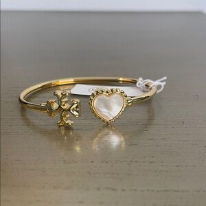 Tory Burch Gold cuff with Heart and Tory Burch symbol